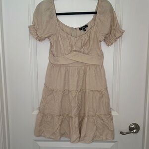 Beige color size Junior M. Light and flowey with a nice cut